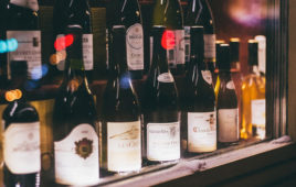 wine-bottles-on-a-shelf.