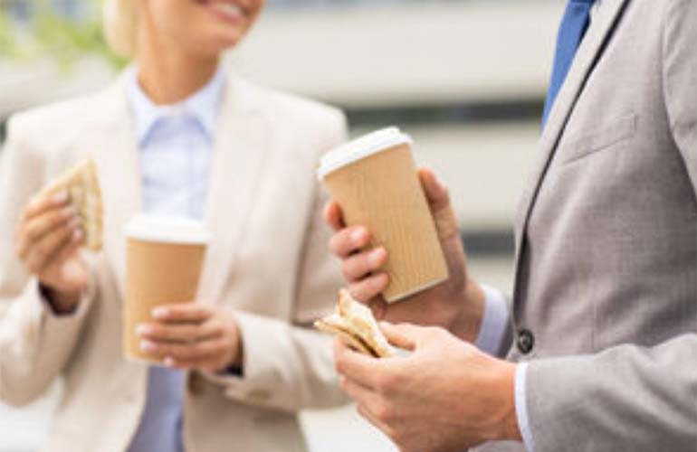 two-people-holding-coffee.