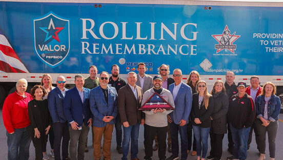 group-of-people-in-front-of-rolling-remembrance-truck.
