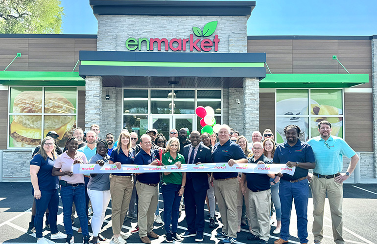 people-with-a-ribbon-in-front-of-a-store.