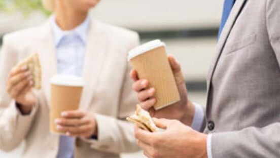 two-people-holding-coffee.