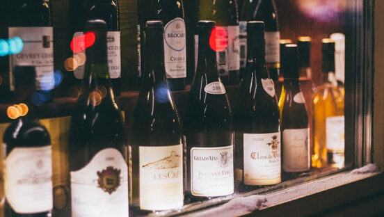 wine-bottles-on-a-shelf.