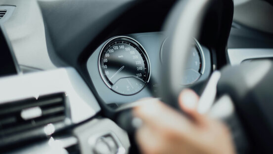 driving-hands-on-wheel.