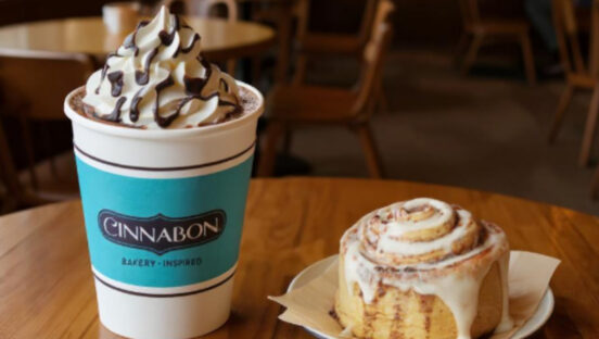 cinnabon-hot-chocolate-next-to-cinnamon-roll.