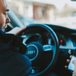 man-with-phone-in-car.