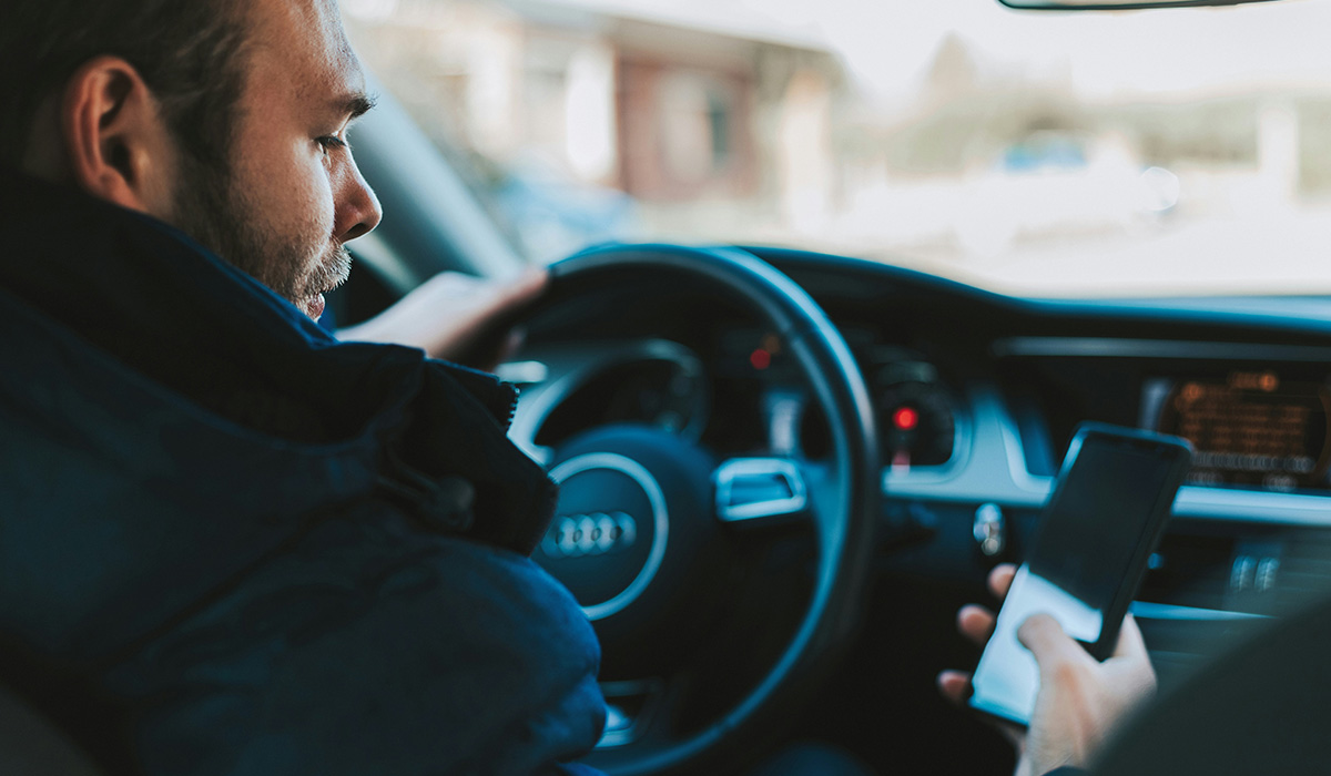 man-with-phone-in-car.