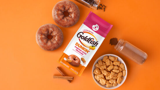 goldfish-doughnuts-cinnamon-nutmeg-clove-and-bowl-of-grahams-on-orange-background.